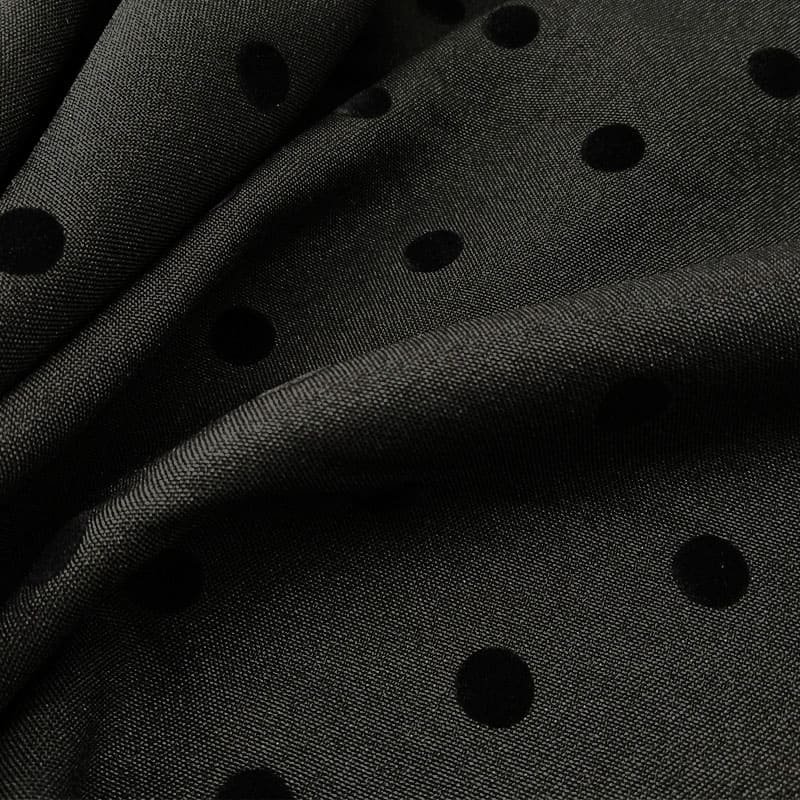 Tela en negro con lunar negro flocado